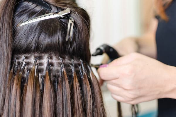 Extensiones adhesivas